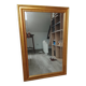 Mirror in an elegant gold frame. 84 x 57.