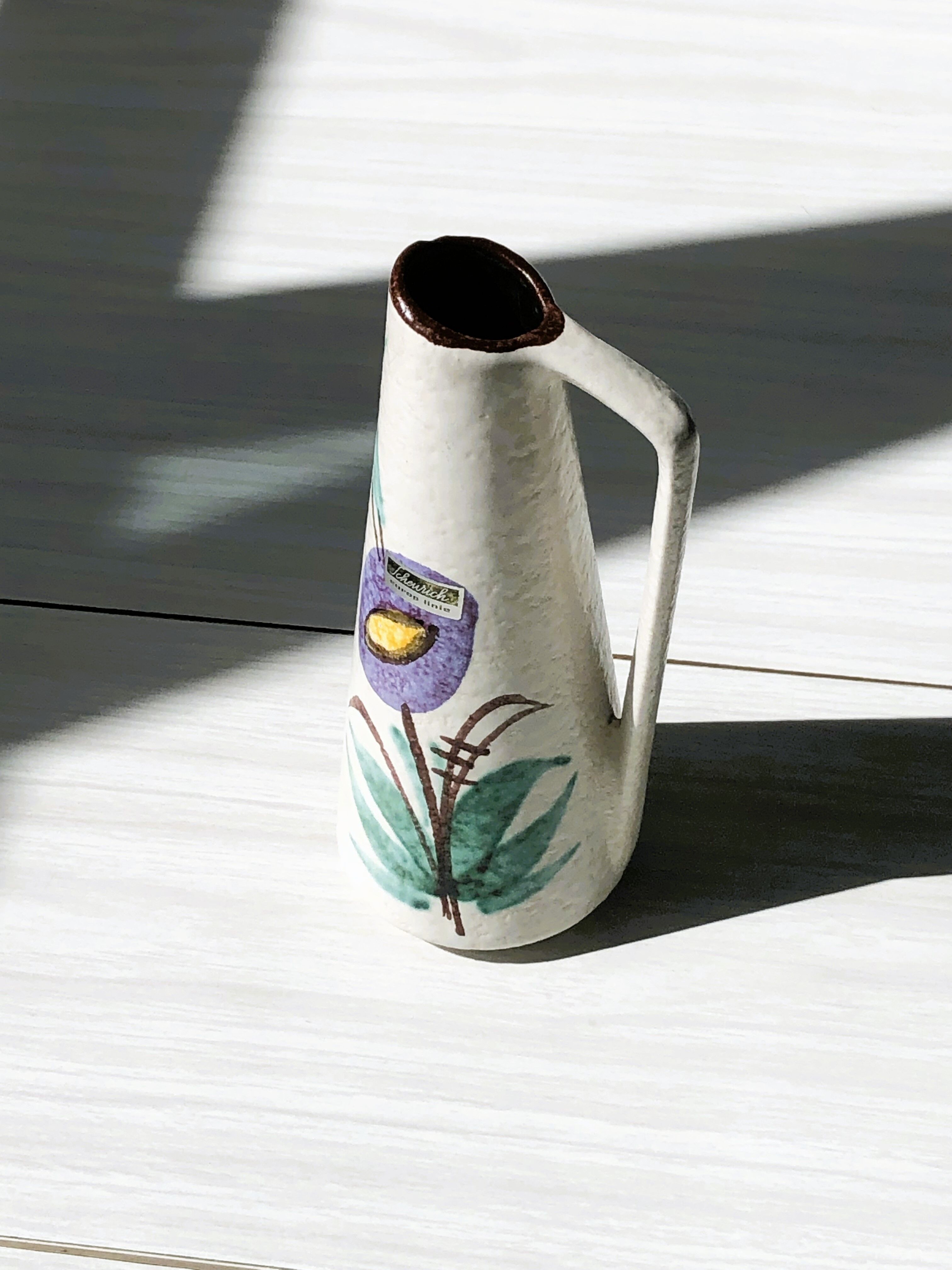 Very decorative colorful pitcher vase with Scheurich floral motif