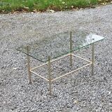 Vintage coffee table in gold and blackened metal with glass top from the 60s