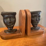 Pair of bronze bookends with masks