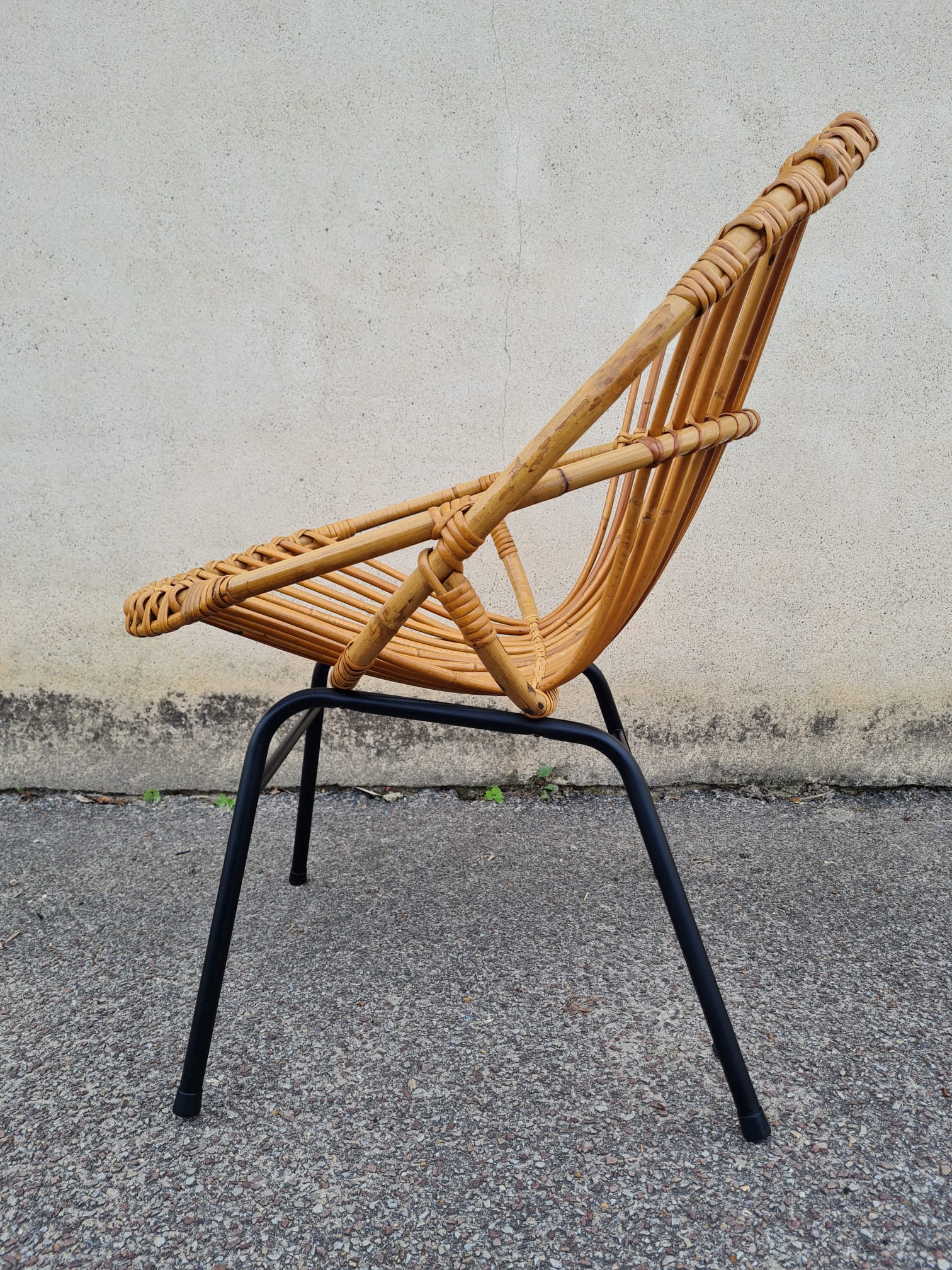 Vintage rattan shell armchair from the 60s
