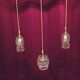 Suspension with 3 transparent bubble glass globes.