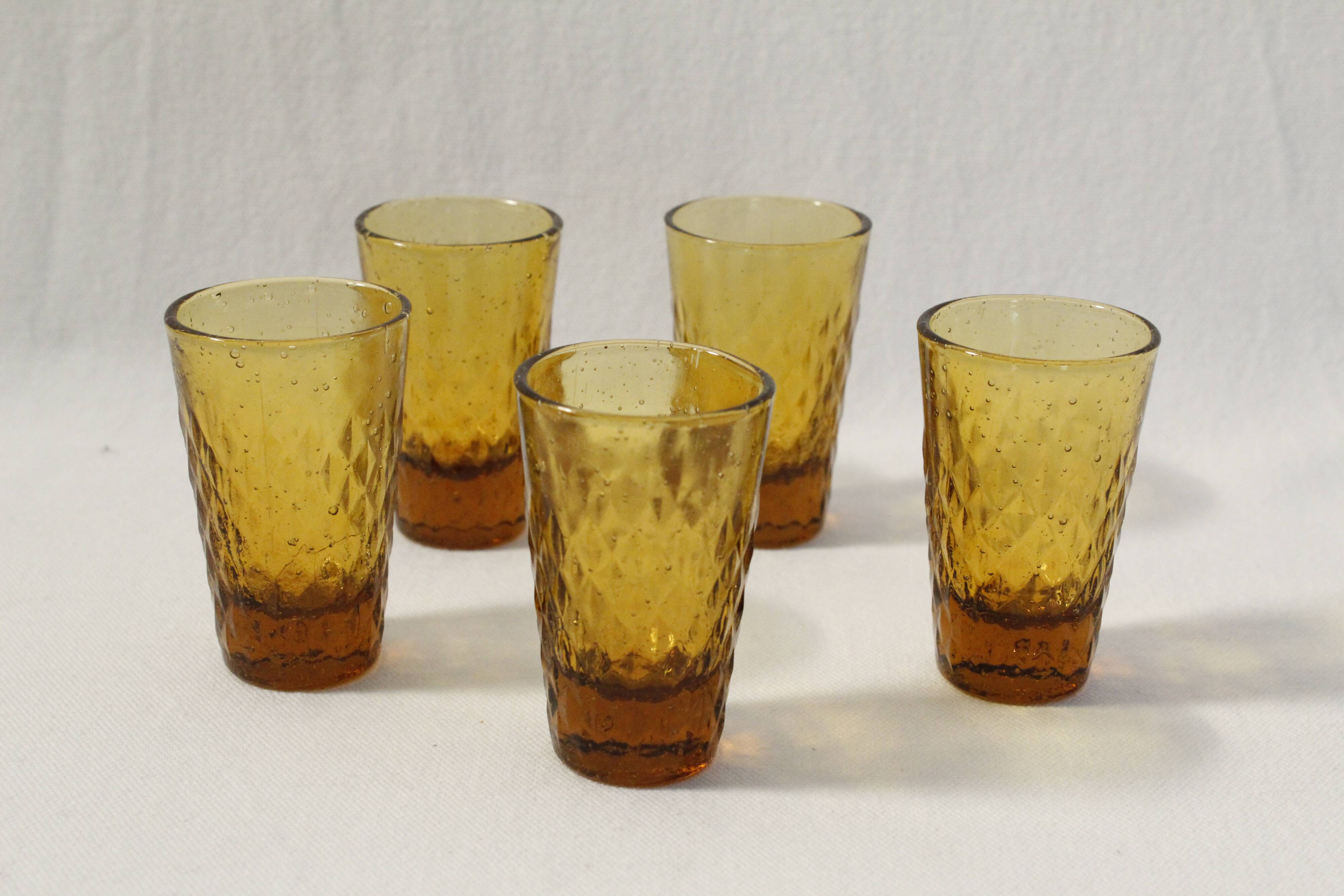 5 vintage amber glass shot glasses