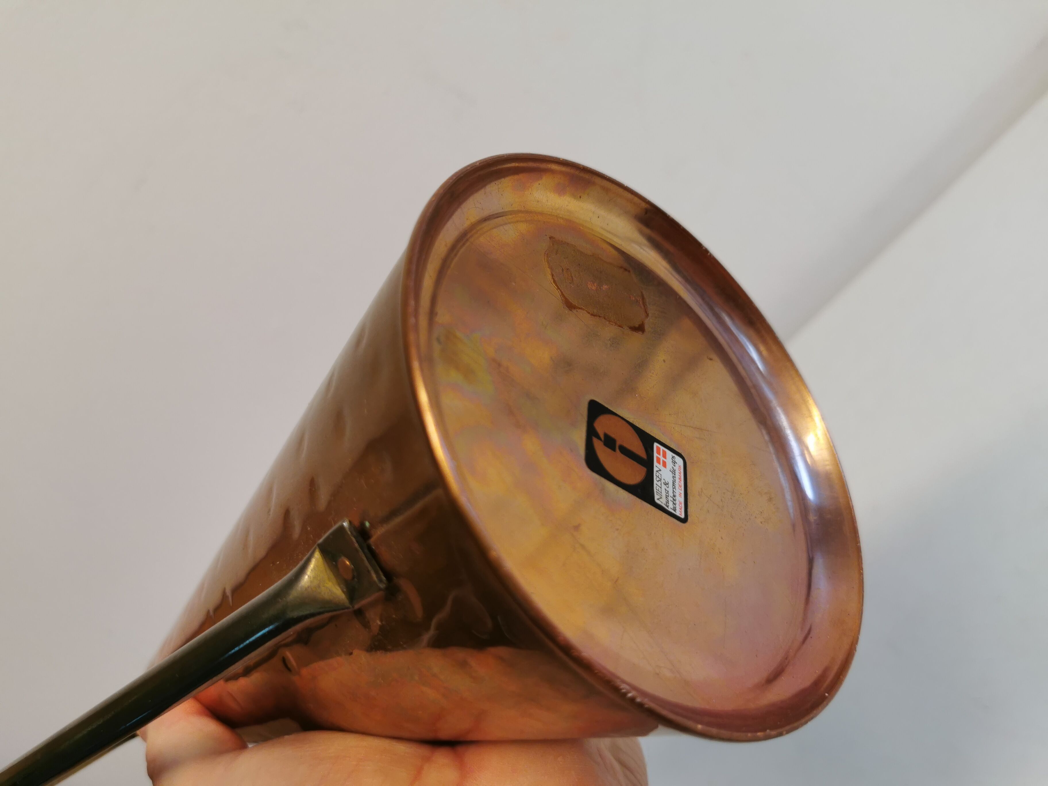 Watering can from the 1950s, made of hammered copper and brass