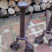 Paire de chenets en fonte
