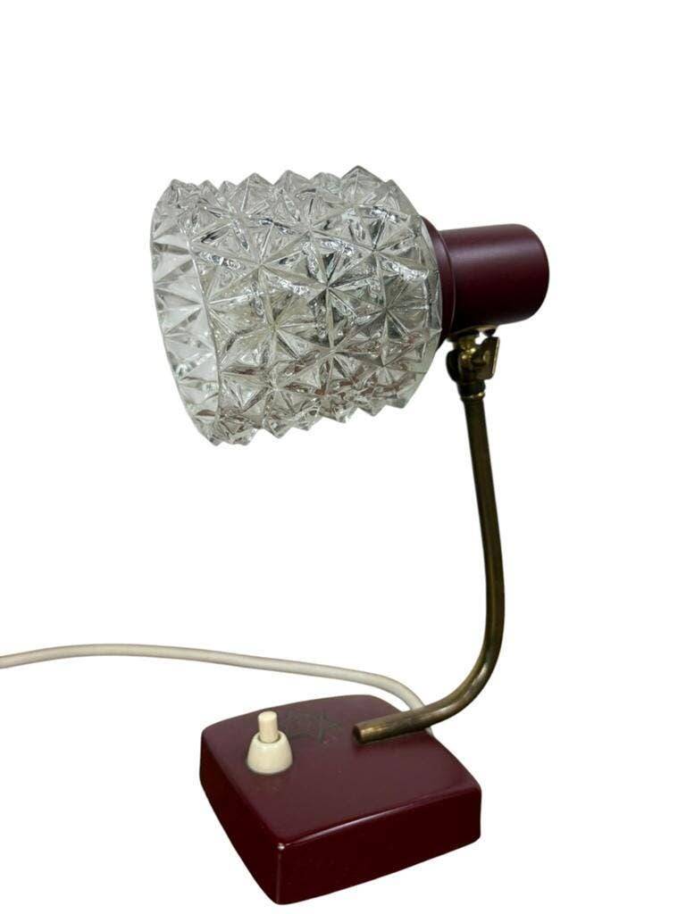 Vintage burgundy table lamp with glass shade.