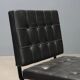 Vintage armchair in metal and black faux leather, Italian design from the 1970s.