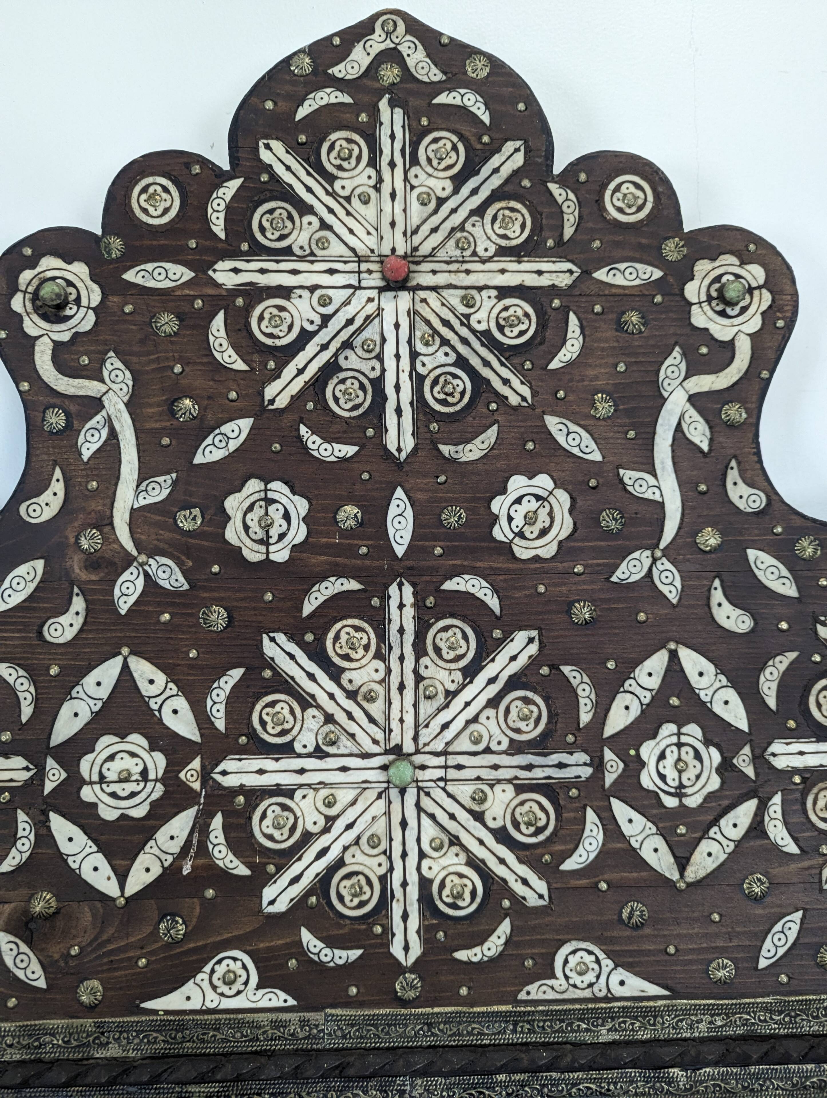 Orientalist mirror with bone inlays and hard stone cabochons.