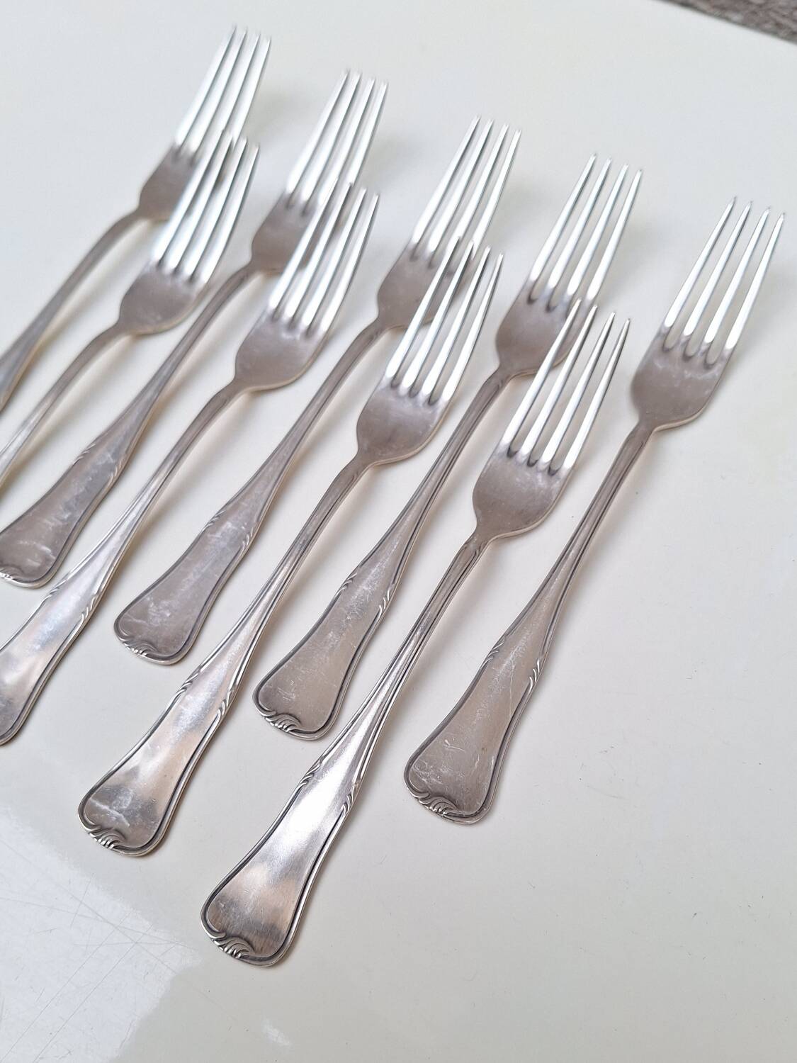 Set of small silver-plated metal forks