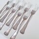 Set of small silver-plated metal forks