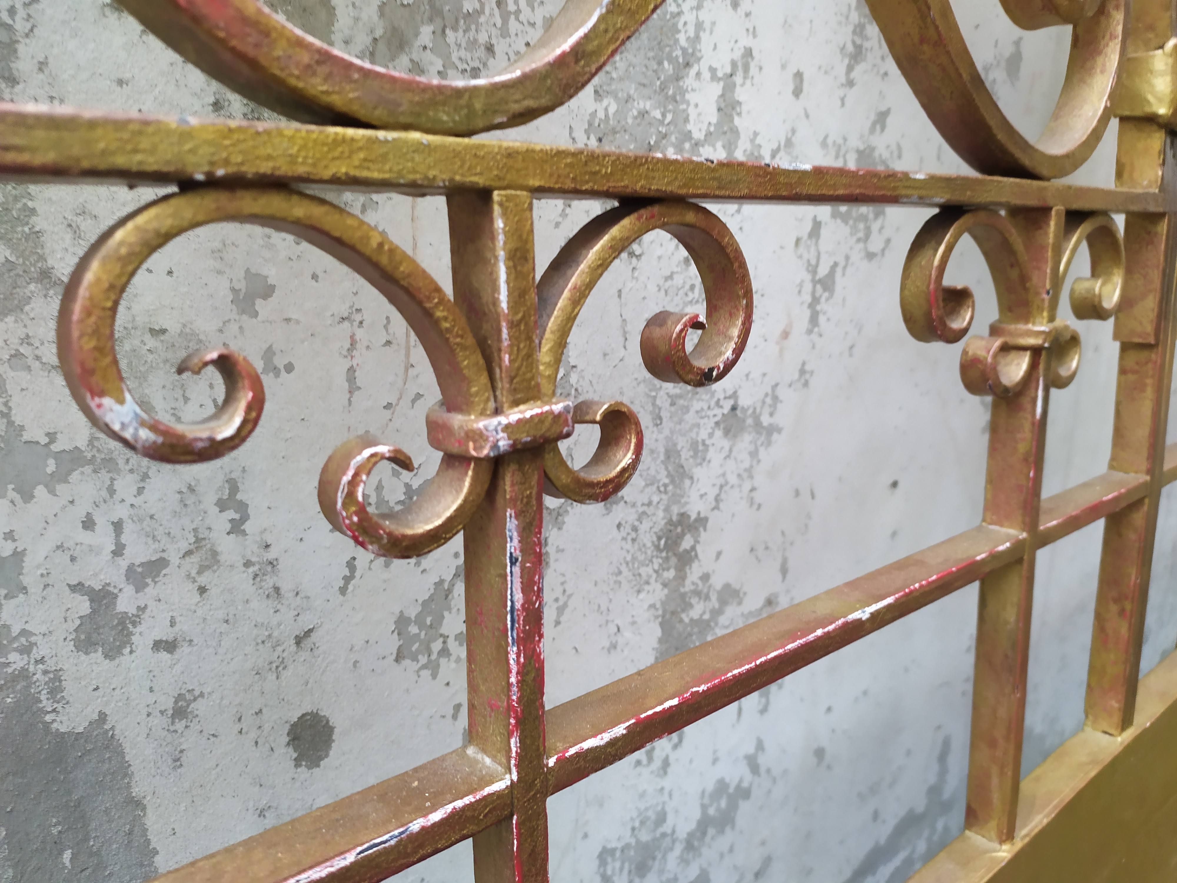 Golden wrought iron bedhead