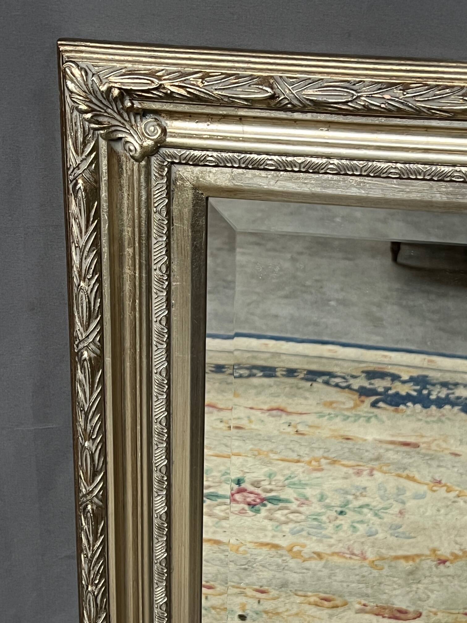 Faux mirror in a beautiful baguette frame