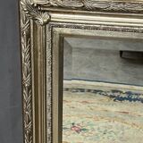 Miroir de fausset dans un beau cadre baguette