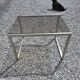Table basse en métal brossé dessus verre fumé, années 70/80