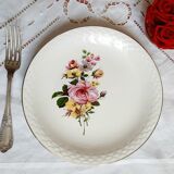 Flat earthenware plates with gilded edges
