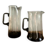 Design jugs in smoked glass with pinched neck. around 1970
