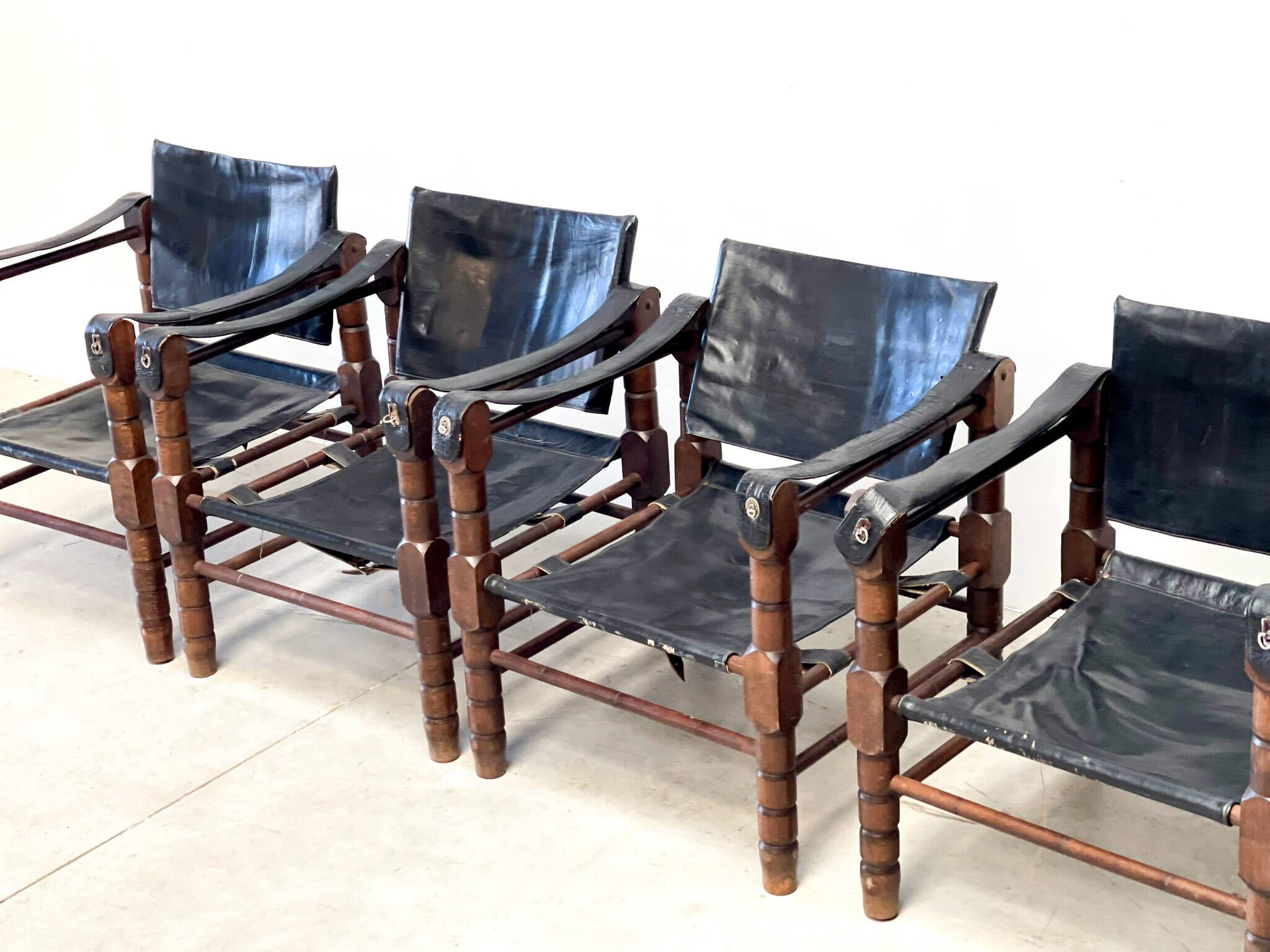 Mid century leather safari armchairs, 1960s