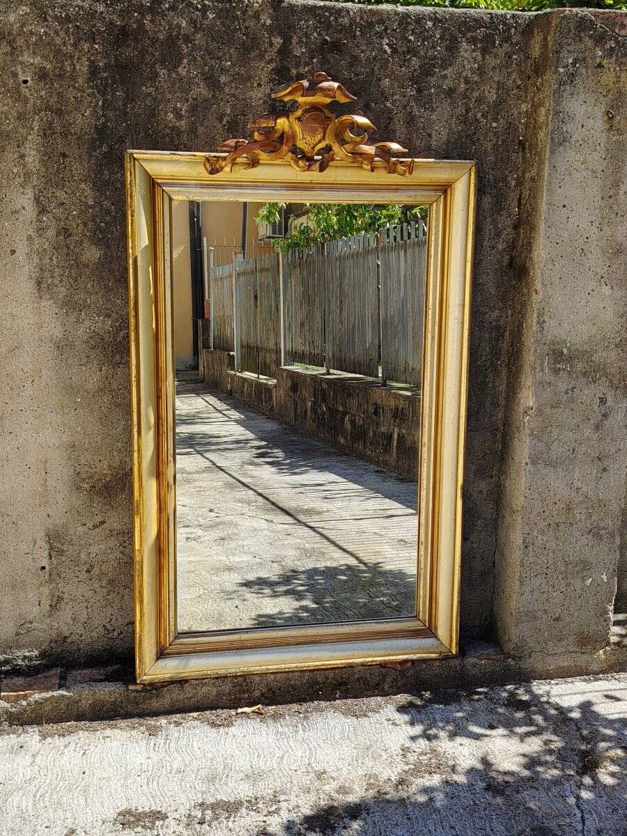 Large mirror/19th-century wooden frames, gilded.
