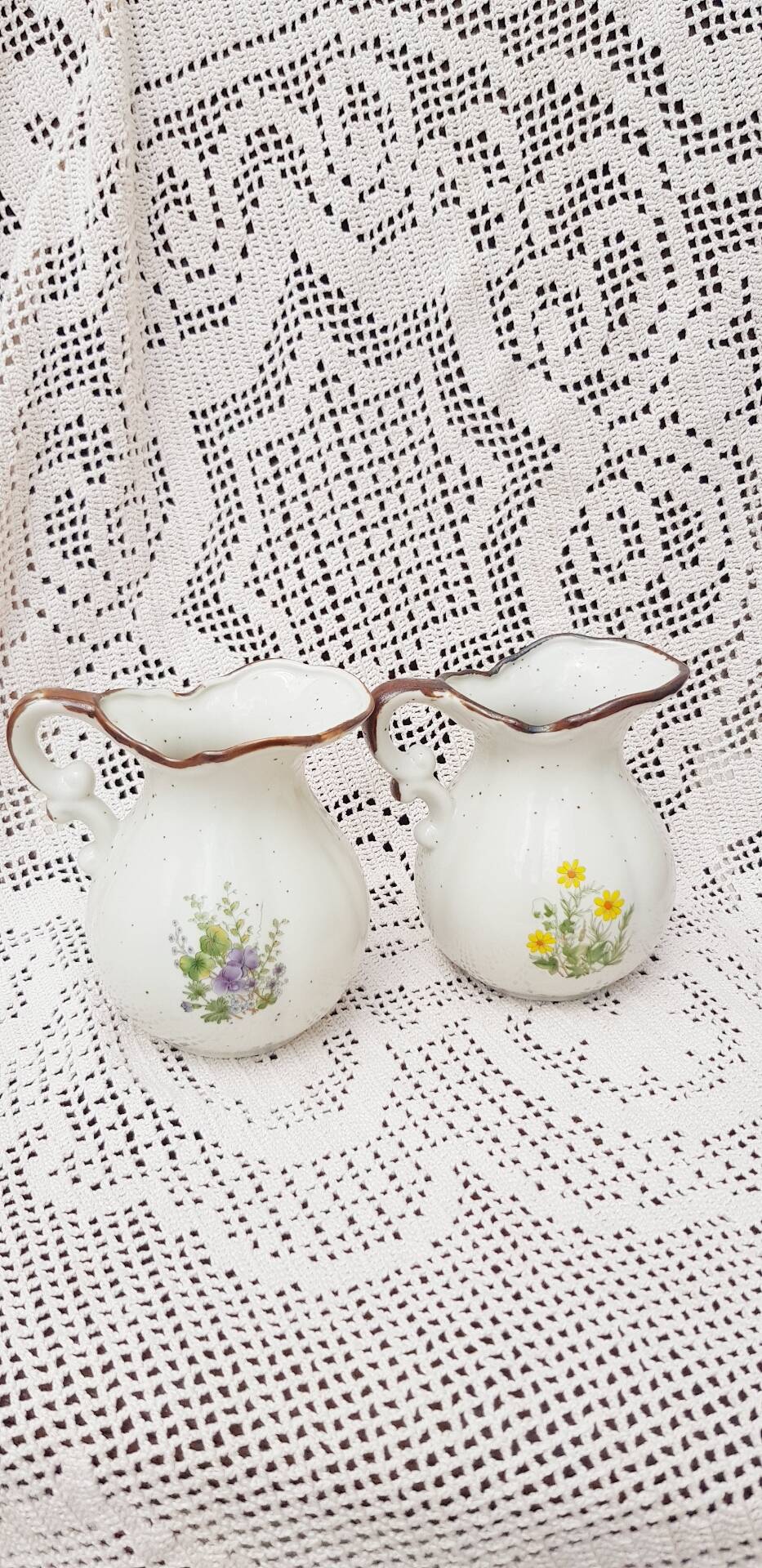 Vases, jugs with botanical patterns
