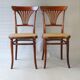 2 Thonet N°221 chairs, caned Art Nouveau bronze decor