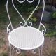 Mategot-style perforated wrought iron garden furniture with table and armchairs