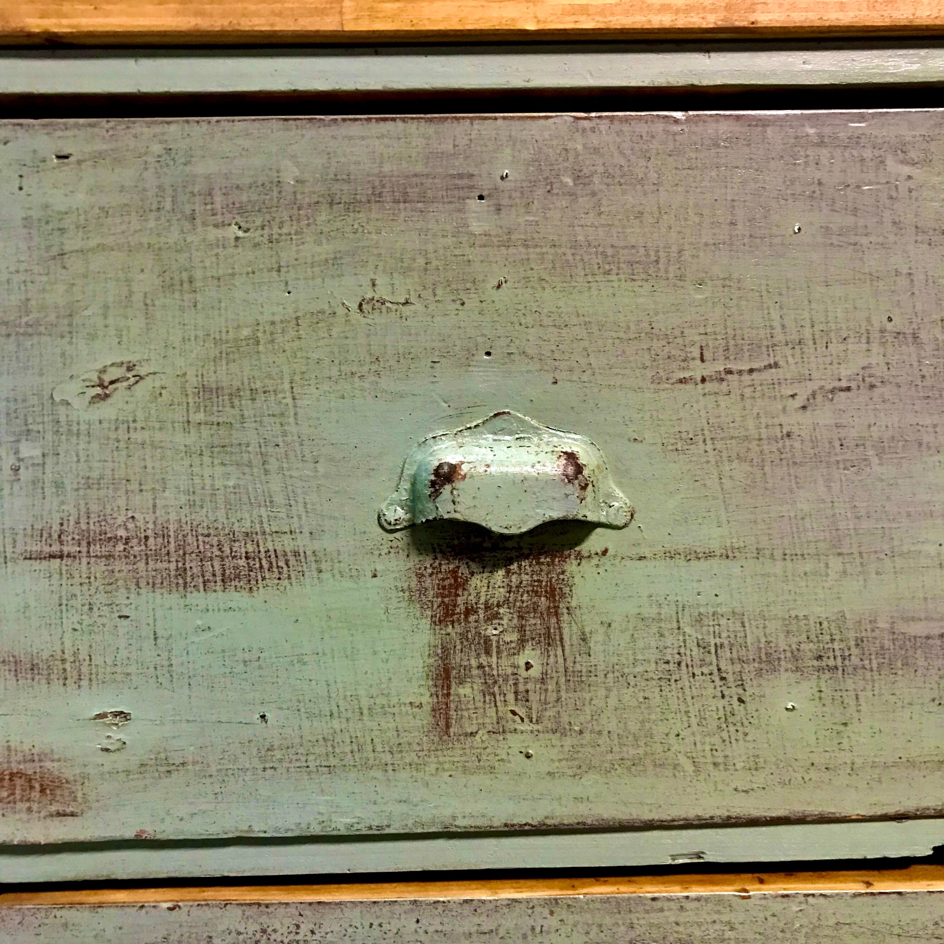 Furniture of metier enfilade with restored wooden drawers