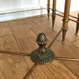 Pull-out tables in golden brass and marble