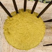 Pair of yellow moumoute chairs