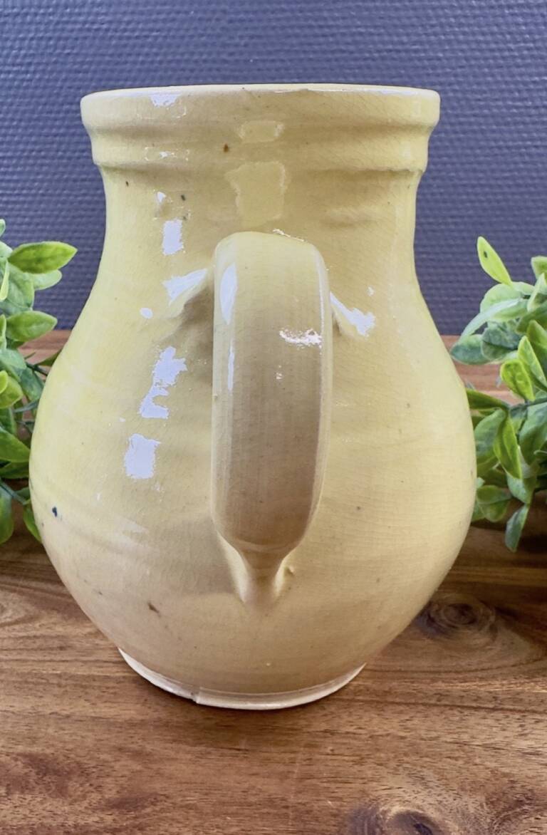 Earthenware pitcher from Savoy with bird decoration.