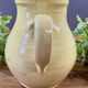 Earthenware pitcher from Savoy with bird decoration.