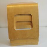 Design stool/side table made of curved plywood.