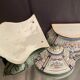 Wall fountain in earthenware with Rouen decoration