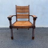 Vintage armchair in straw and brutalist wood