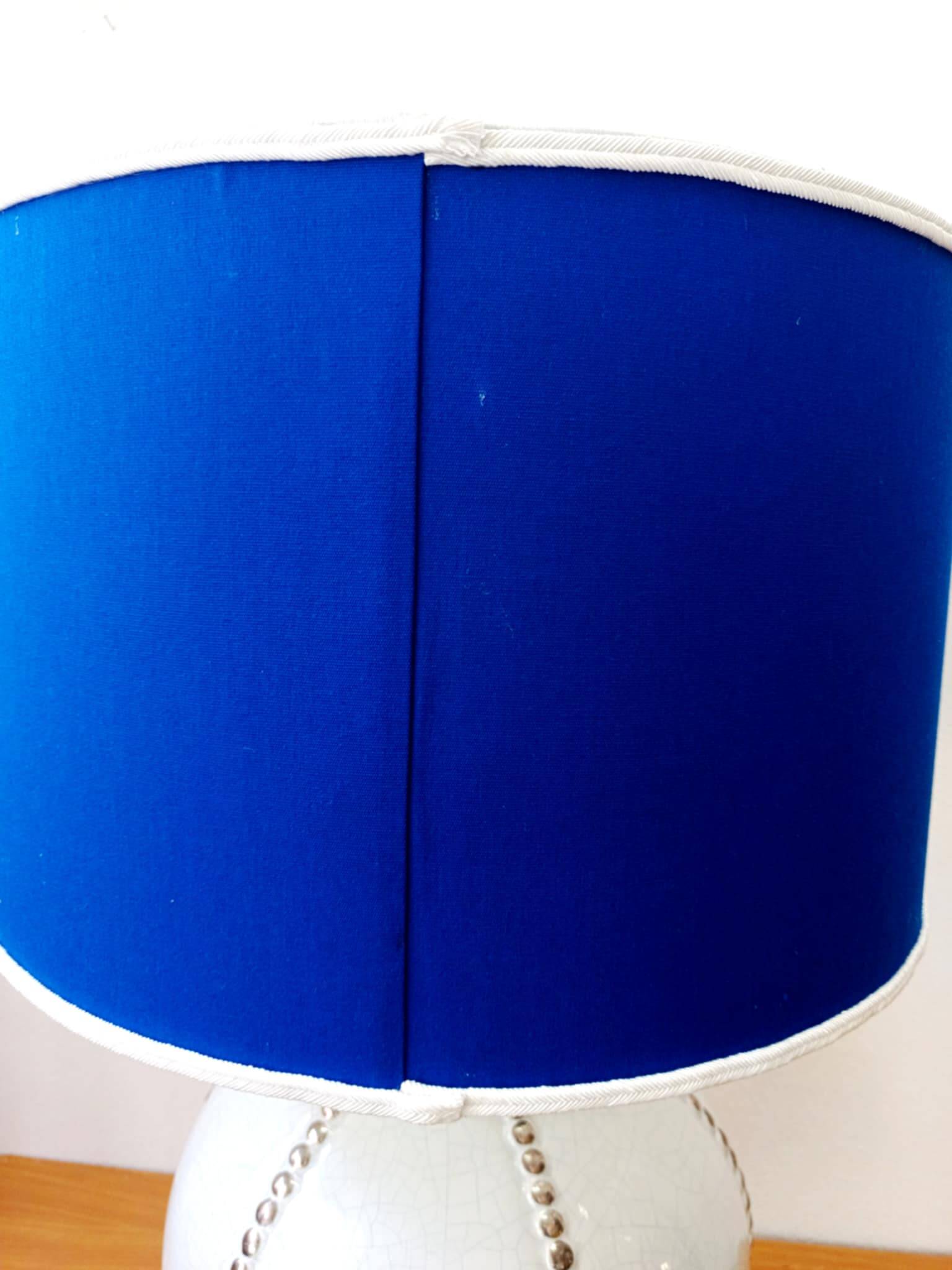 Longwy earthenware lamp and Klein blue lampshade