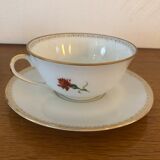 2 porcelain teacups and under teacups floral motifs