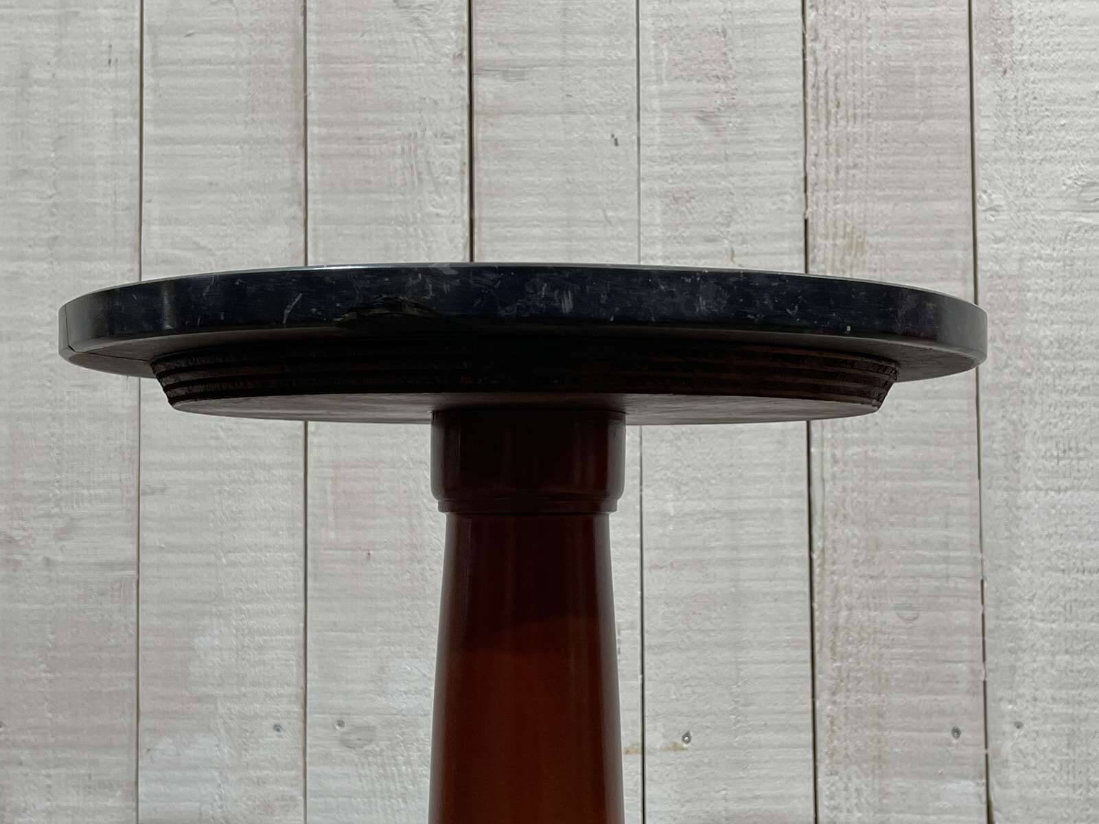 1960s Empire style pedestal table in cherry wood with black marble top