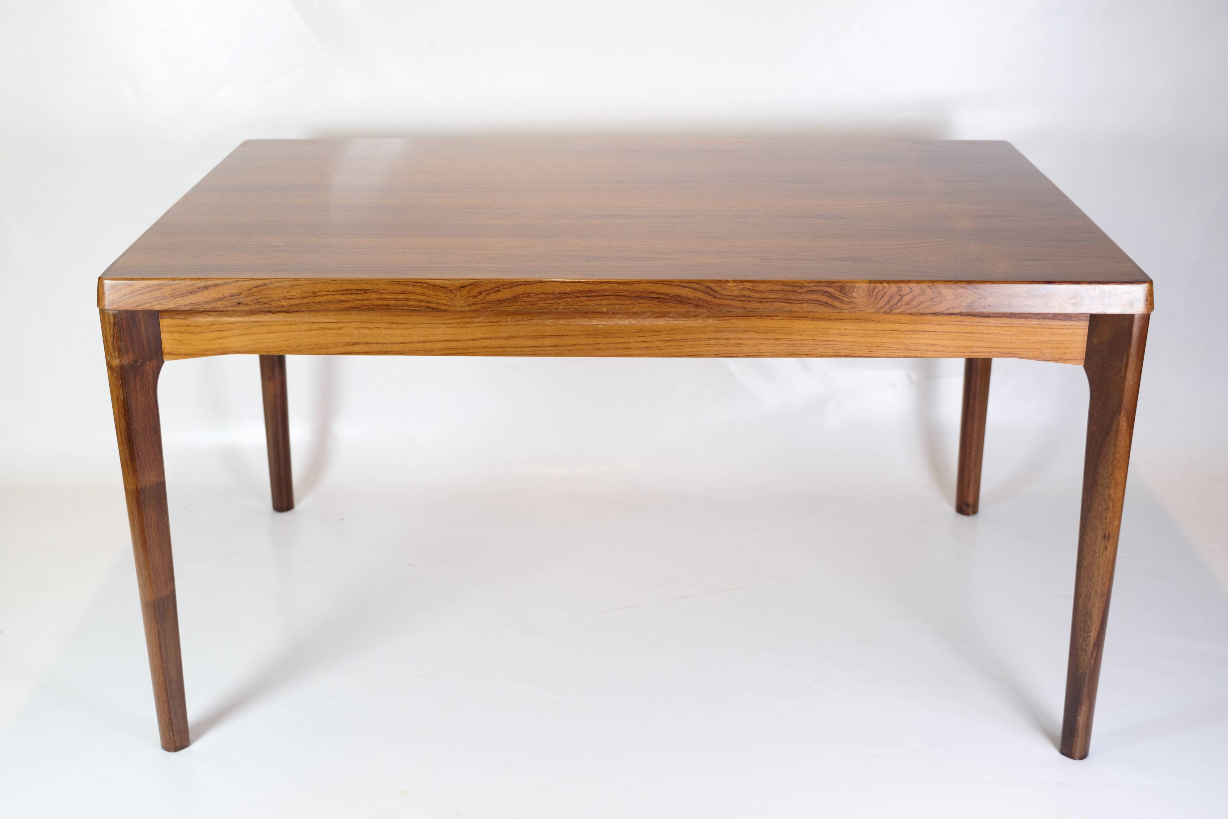 Dining Table With extensions Made In Rosewood By Henning Kjærnulf From 1960s