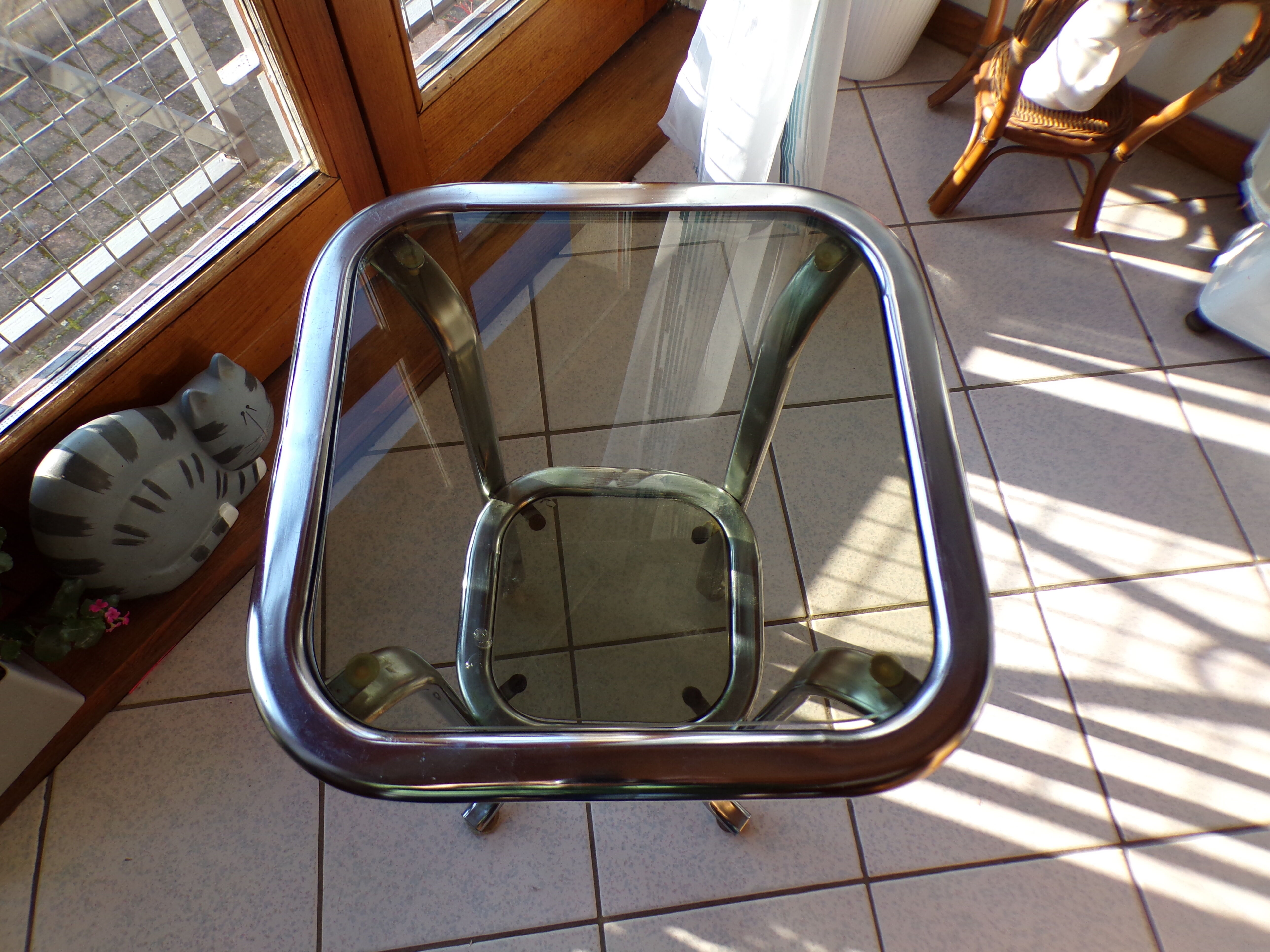 Bedside table or end of tubular steel sofa