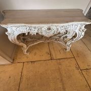 Large carved white wooden console