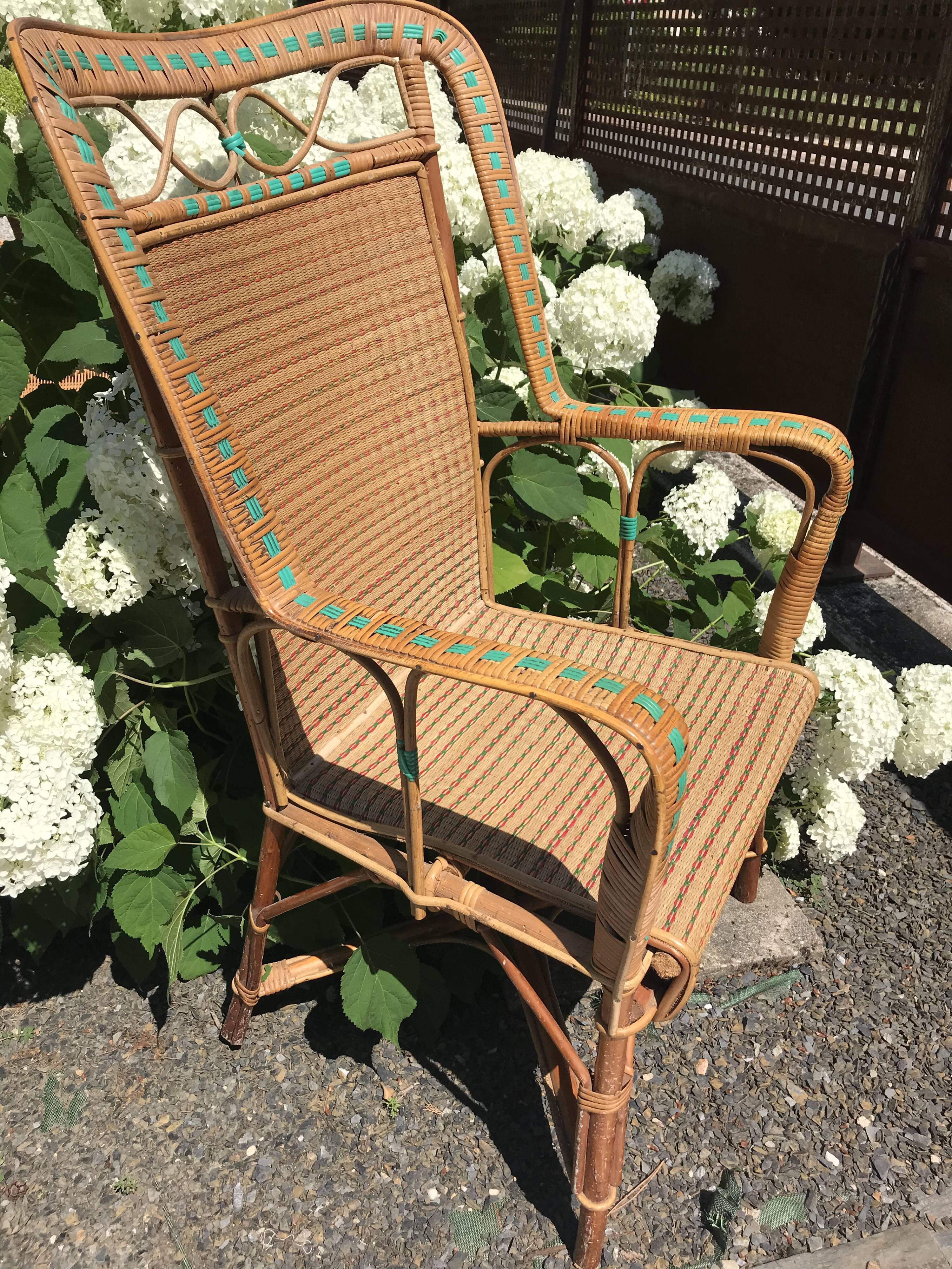 Rattan armchair with high back