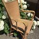 Rattan armchair with high back