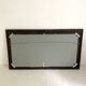 1950s mirror, matte black wood with a patina.