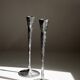 Pair of aluminium candle holders