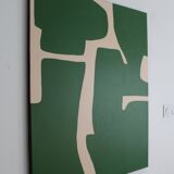 Abstract green art on a beige background.