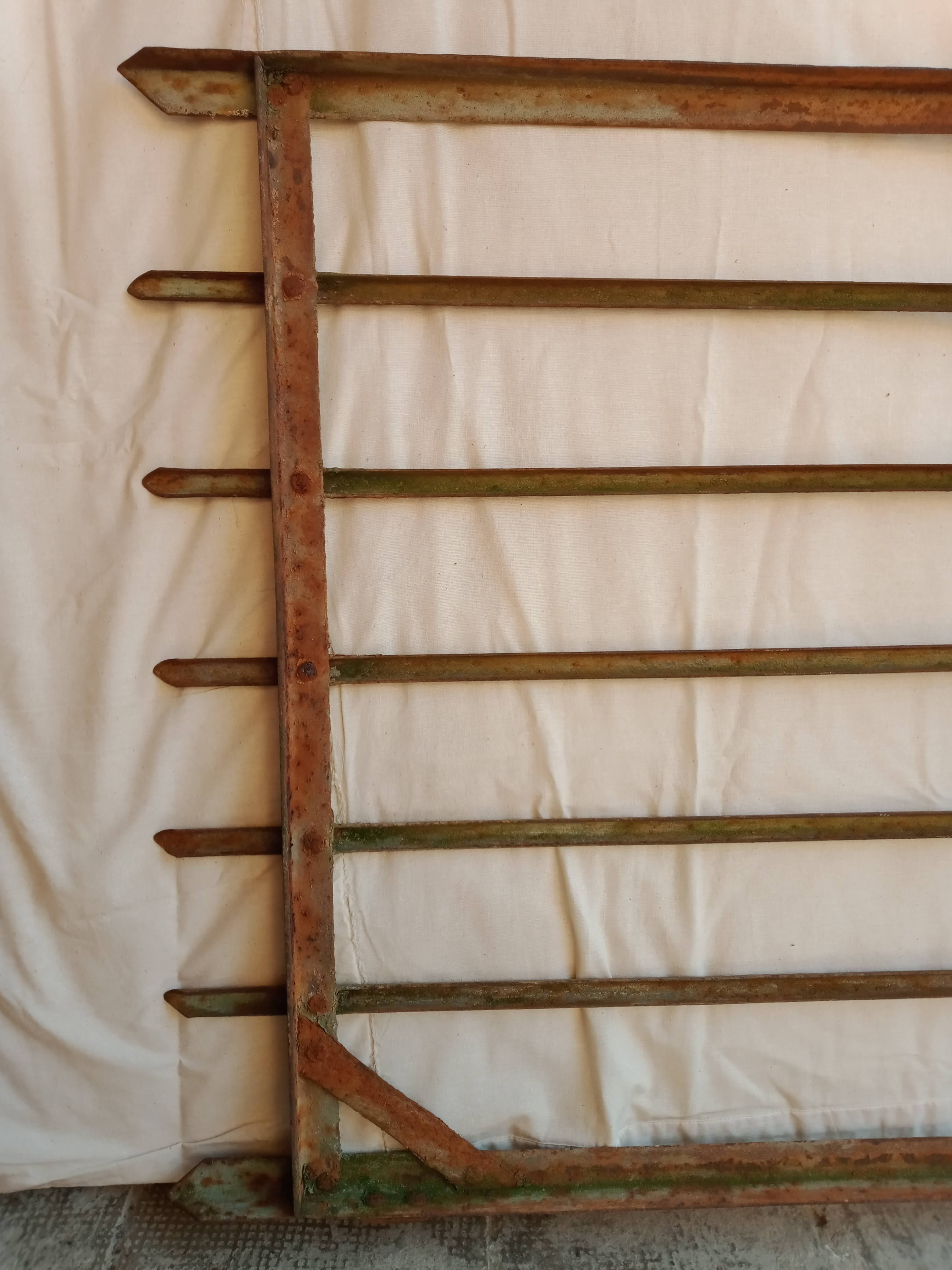 Old riveted metal gate