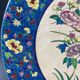 Large circular earthenware dish from Louvière with Longwy style bird decoration