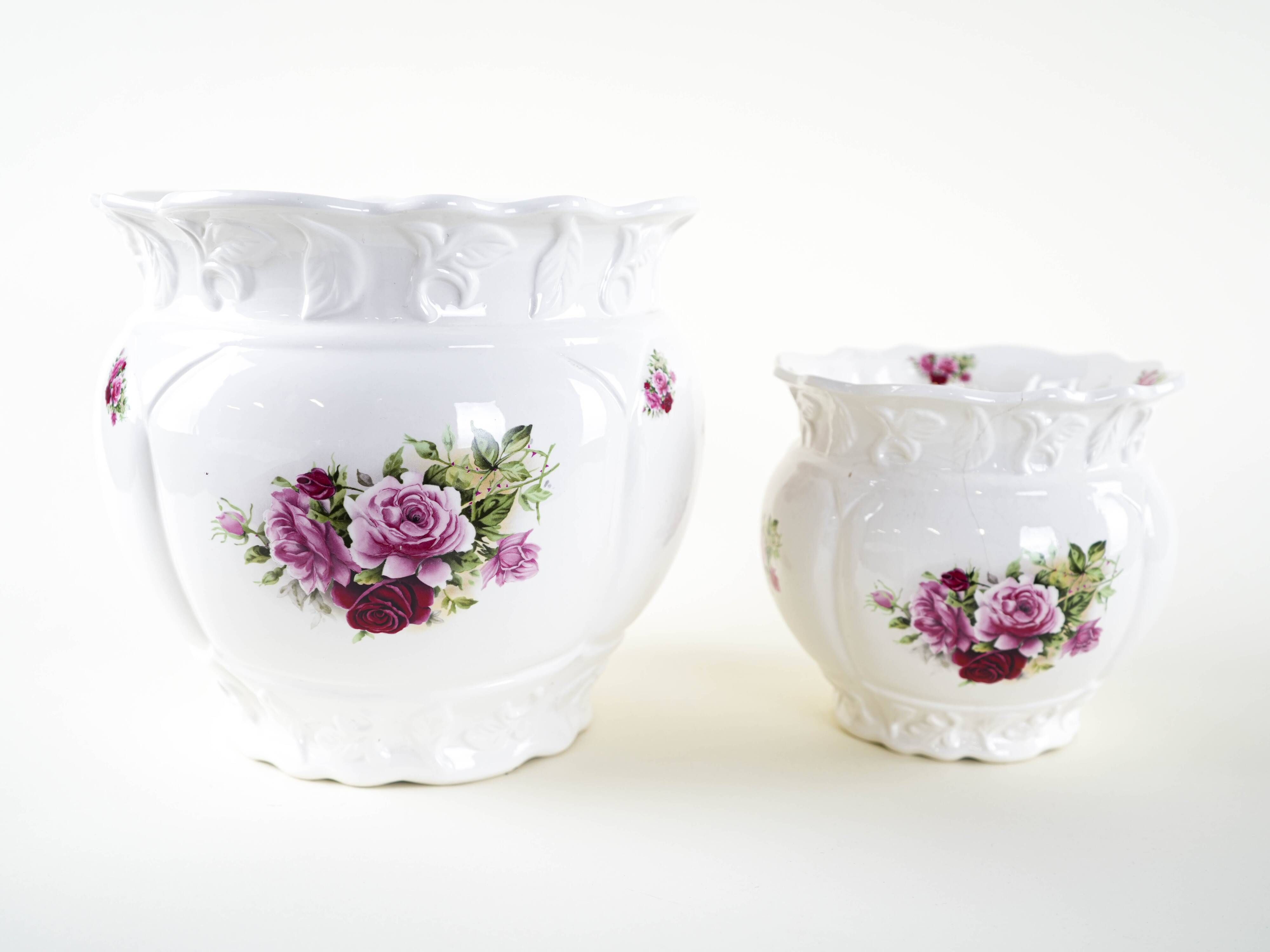 Pair of decorative ceramic vases with hand-painted roses, Art Deco style, European