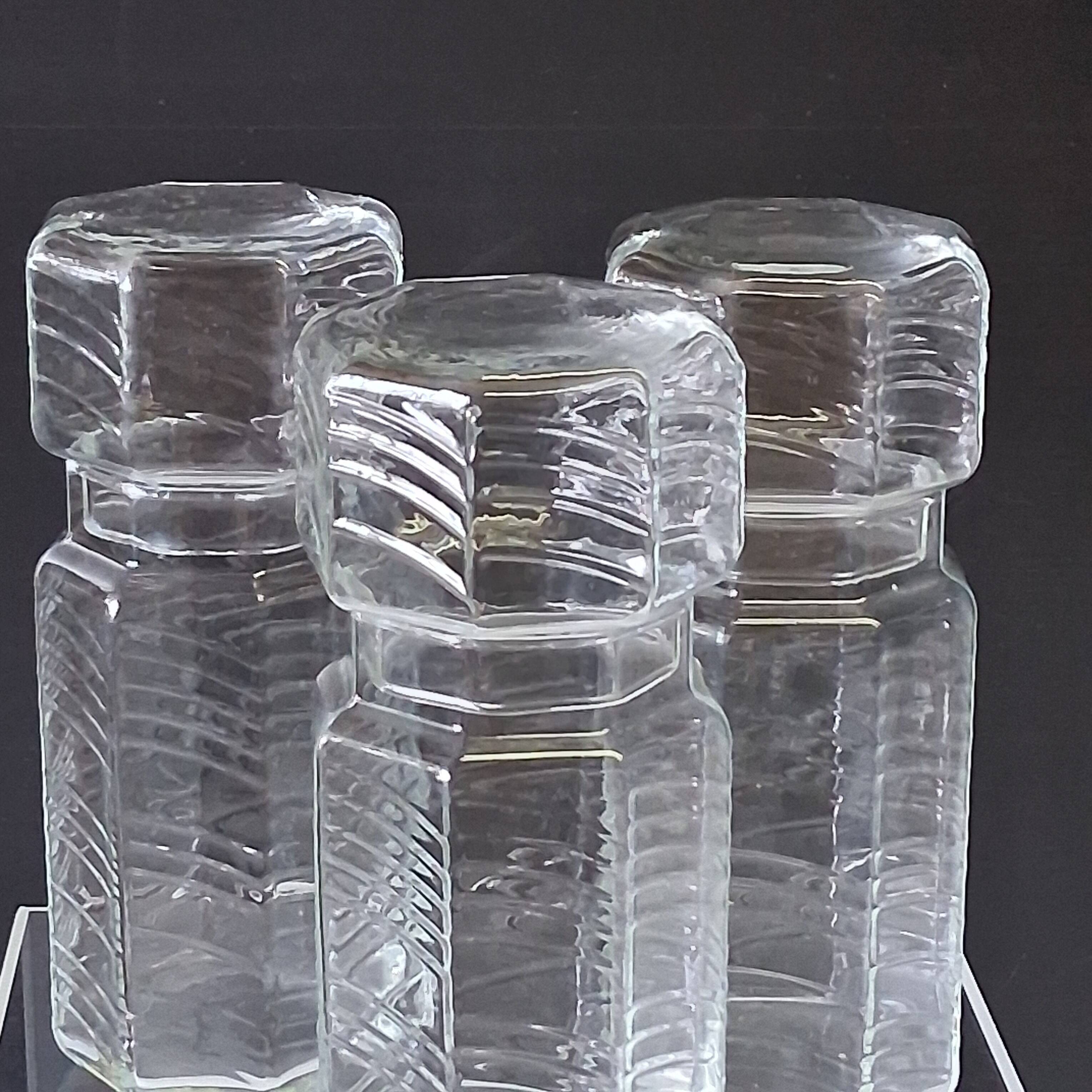 Set of 3 glass jars with old transparent lids in very good condition.