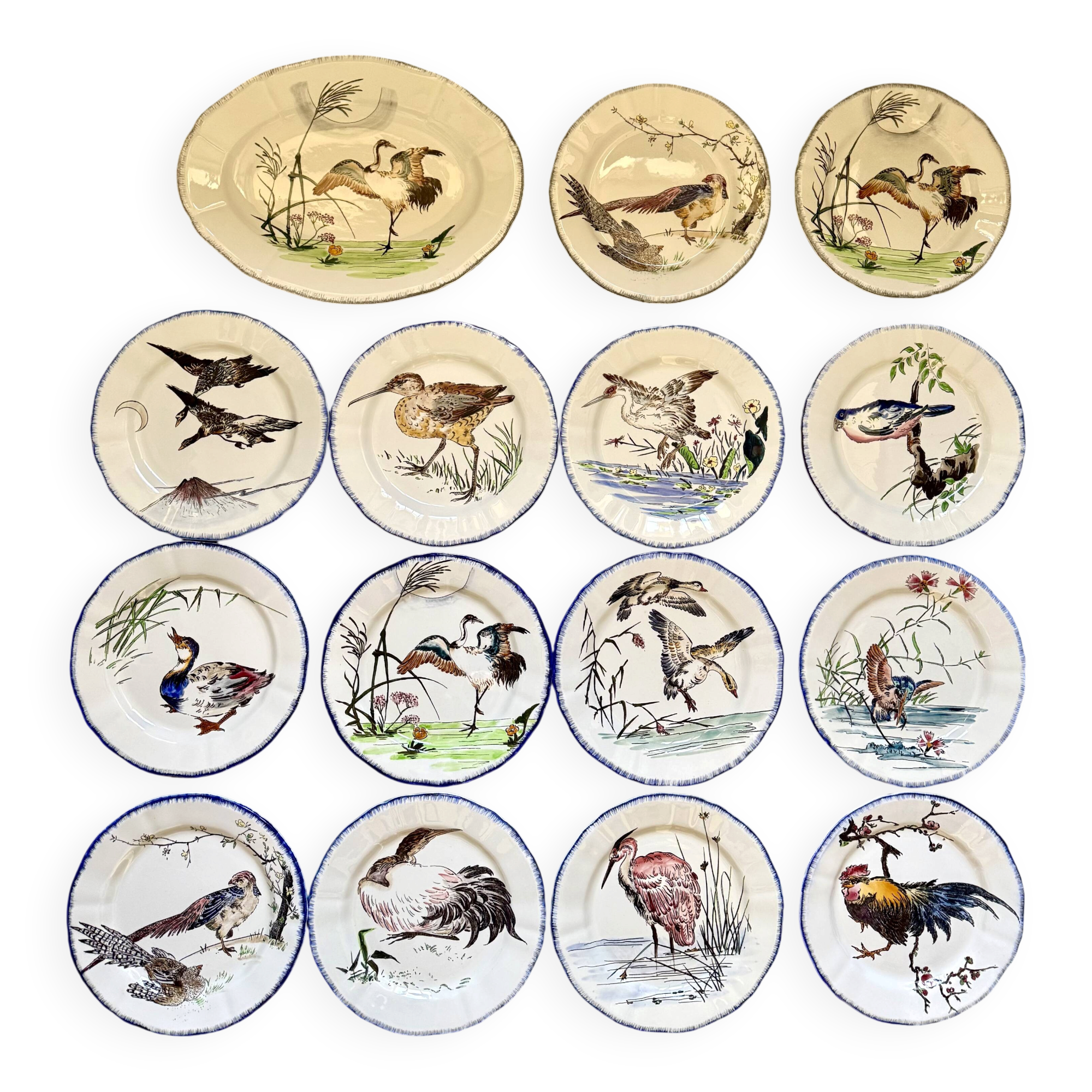 Service de table assiettes et plats Gien modèle grands oiseaux