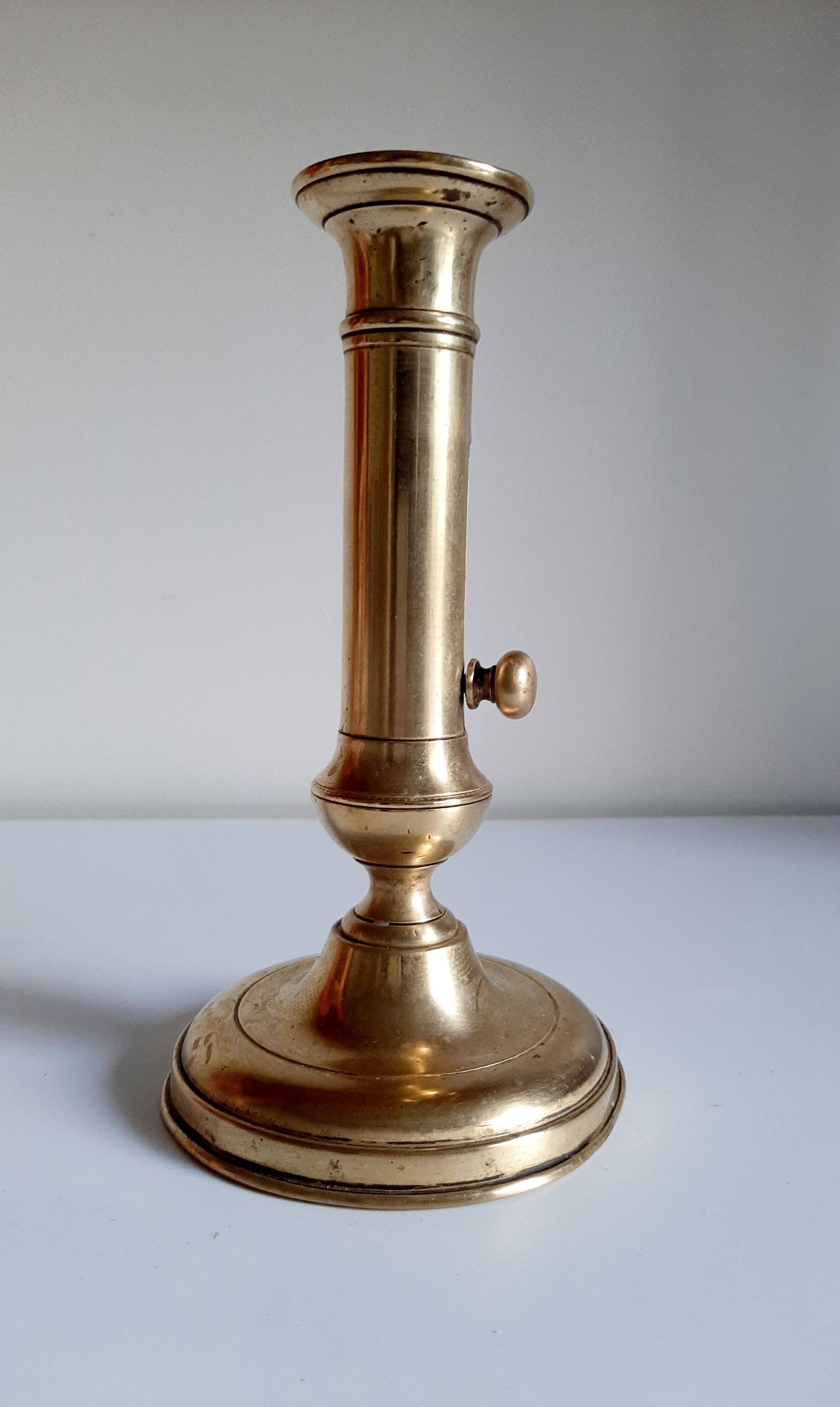 Golden brass candle holder